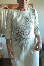 Load image into Gallery viewer, Close-up of gray floral and geometric detailing across the dress bodice