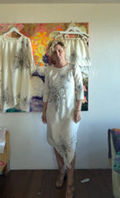 Load image into Gallery viewer, Front view of vintage tablecloth dress showing asymmetrical pointed hem