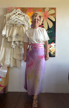 Load image into Gallery viewer, Hand-dyed cupro wrap skirt styled with a white top, showing the front and waist tie