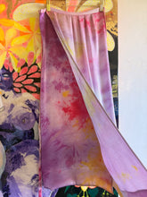 Load image into Gallery viewer, Full view of lavender and pink wrap skirt hanging with a long waist tie
