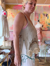 Load image into Gallery viewer, Front detail view showing silk embroidery and crochet hem