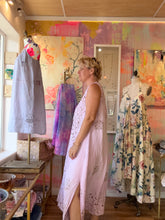 Load image into Gallery viewer, Side view of dusty pink cutwork linen duster showing length and silhouette