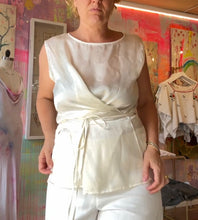 Load image into Gallery viewer, Front view of hand-dyed ivory satin cupro wrap top with self-tie waist