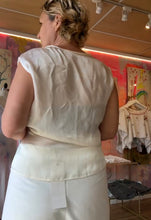 Load image into Gallery viewer, Back view of hand-dyed ivory satin cupro wrap top showing clean back and shoulder detail