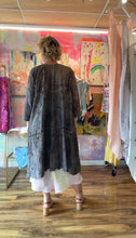 Load image into Gallery viewer, Closer front view of the chocolate-brown duster with scalloped cutwork edges and floral embroidery