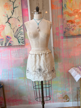 Load image into Gallery viewer, Back view of embroidered vintage linen tablecloth skirt on dress form
