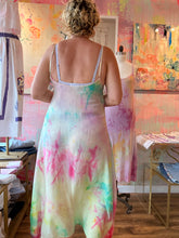 Load image into Gallery viewer, Front full-length view of hand-dyed textured cupro slip dress in pink, blue, green and yellow